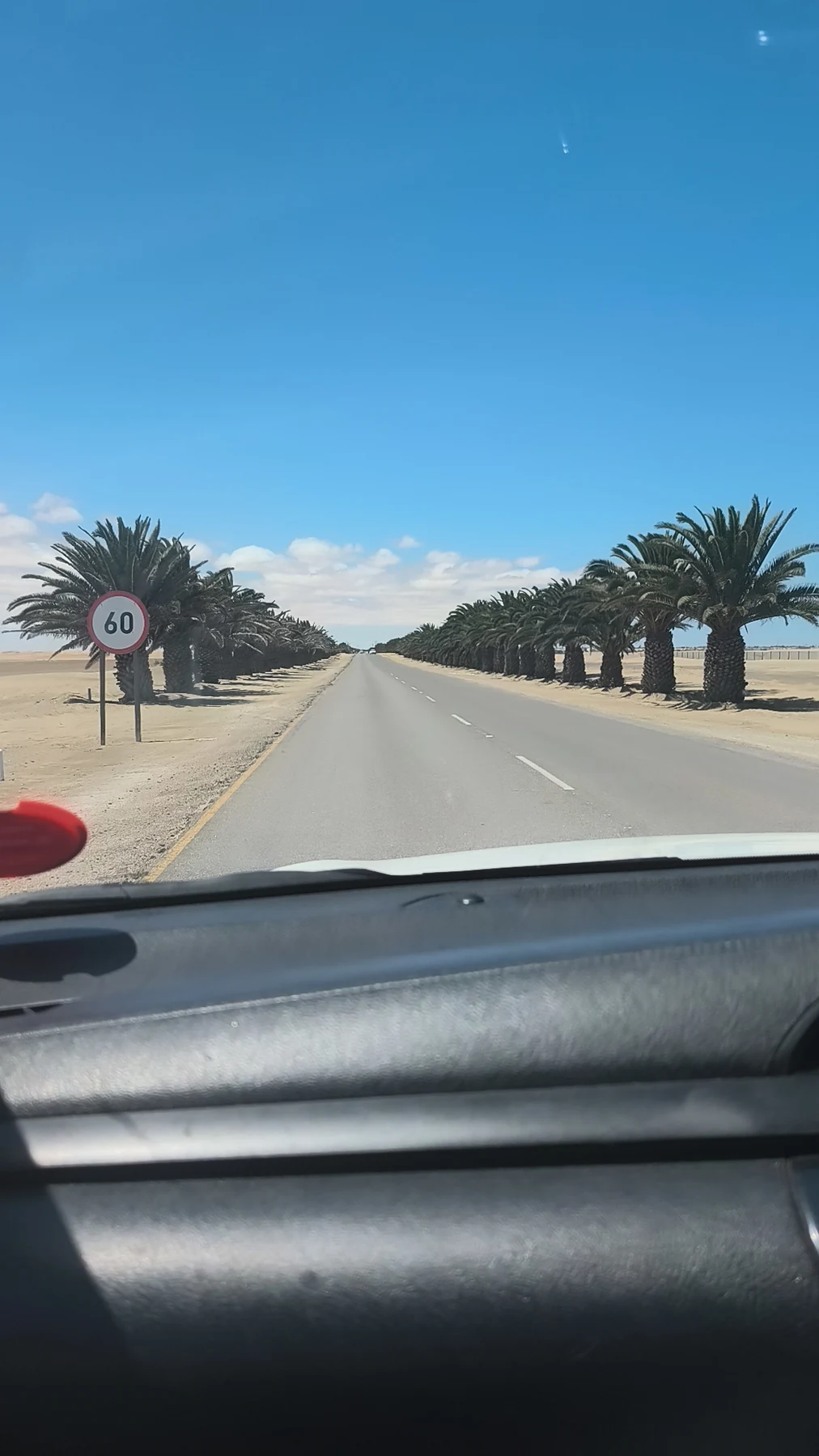 Coastal road scenery near Swakopmund, illustrative rather than the exact Henties Bay route