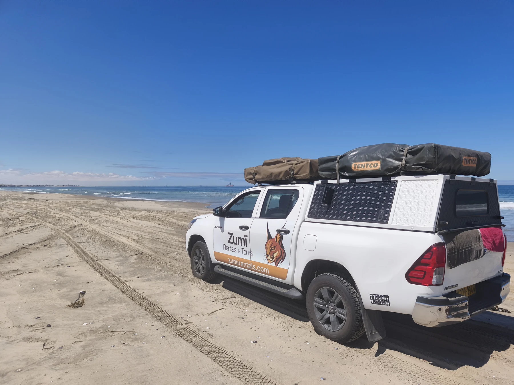 Beach tracks on Namibia’s Atlantic coast, not a documented Sandwich Harbour viewpoint