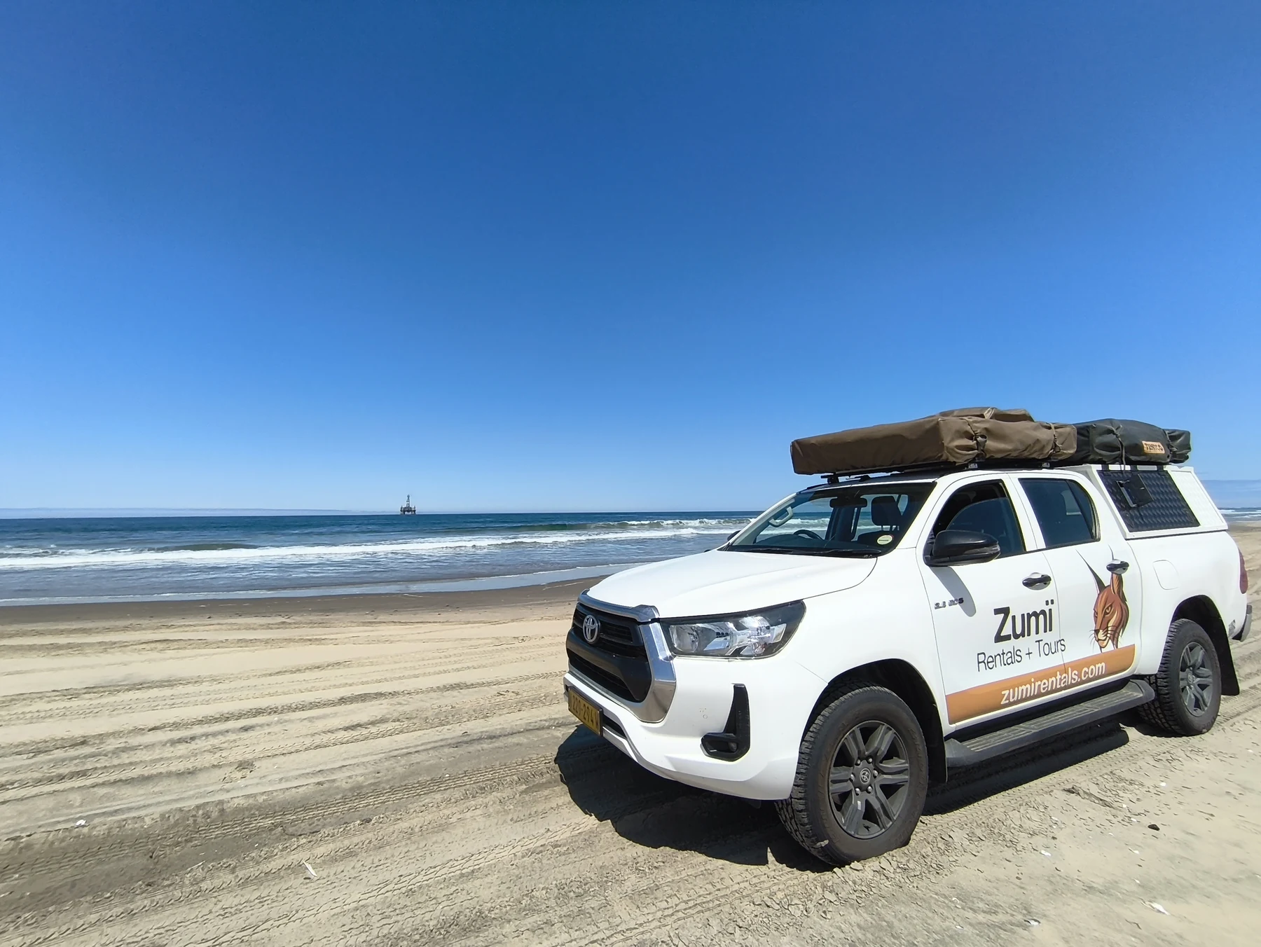 Zumi Hilux photographed on the Namibian coastline north of Walvis Bay